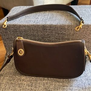 New never used brown mini coach bag with shoulder strap and hand strap